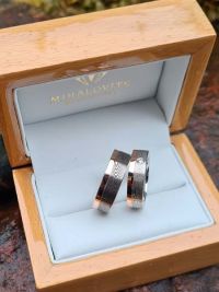 andrea and robert damascus wedding rings