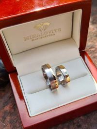 rita and peti titanium wedding rings