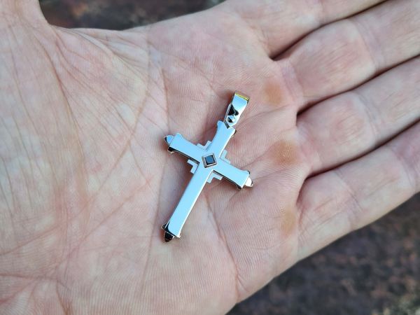 sanyis cross pendant