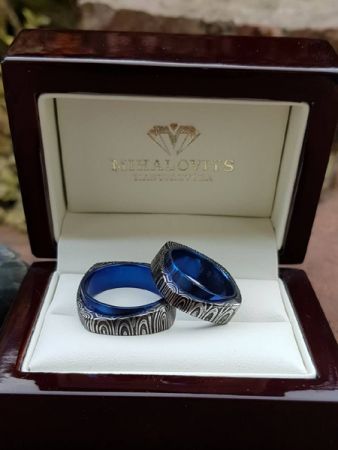 bernadett and tamas damascus titanium wedding rings
