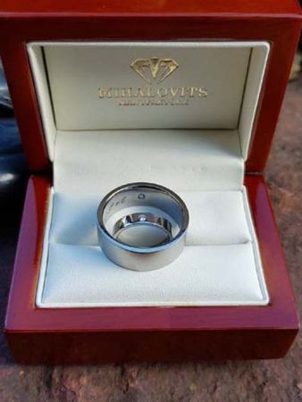 eszter and balazss steel diamond wedding rings