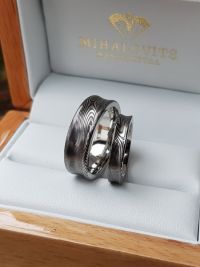 zsuzsanna and gabors concave damascus wedding ring
